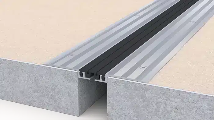 Joint de dilatation de sol rapporté en aluminium 